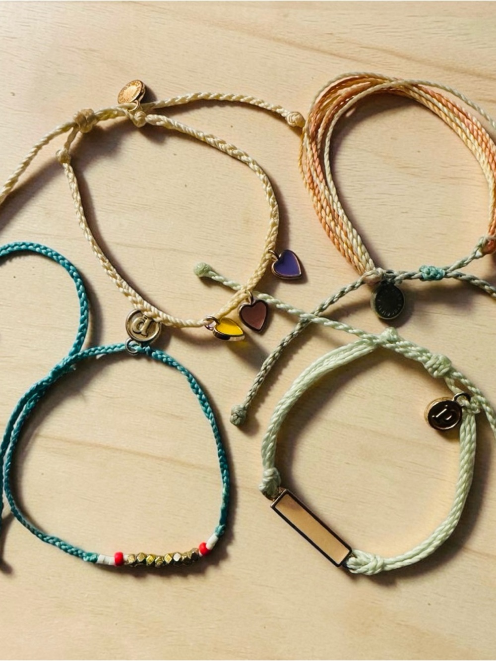 Set of Pura Vida Braided Charm Bracelets - Teal, Peach, Yellow, Mint